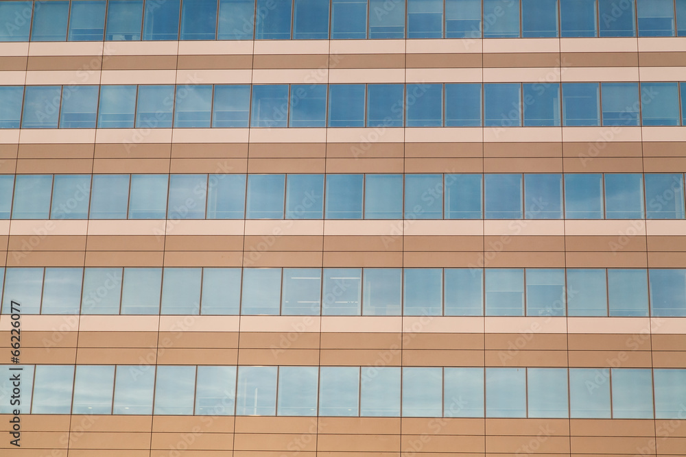 Horizontal row of office building windows in frames Horizontal row of office building windows in frames