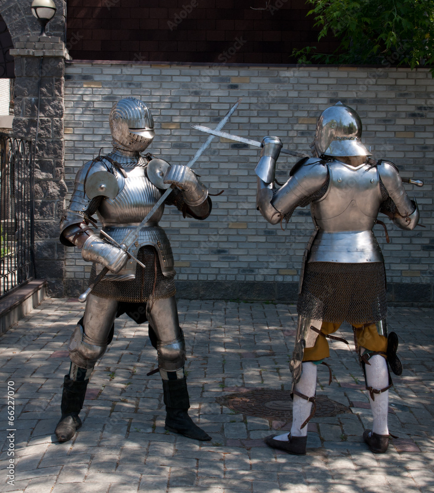 Obraz premium two knights in the ancient metal armor