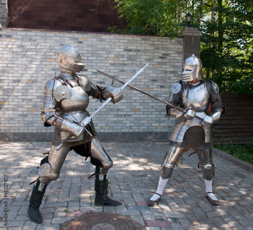 two knights in the ancient metal armor