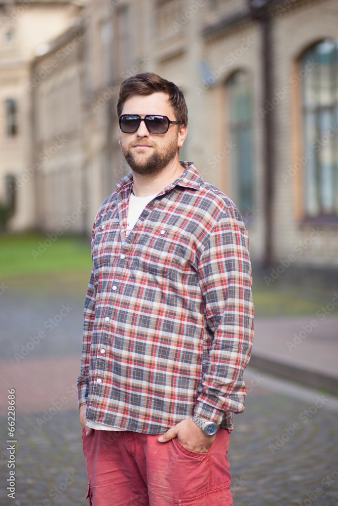portrait of a man against university portrait of a man against university