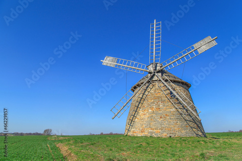 Wind mill isolated on the sky