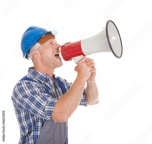 Manual Worker Speaking Into Megaphone