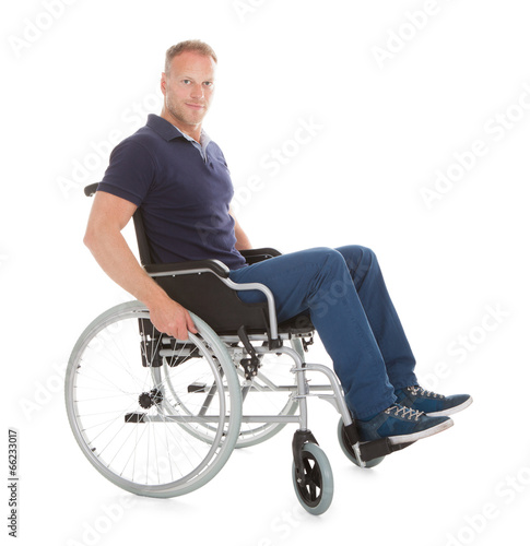 Portrait Of Disabled Man On Wheelchair