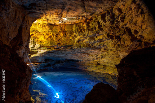Enchanted Cave in Brazil with Sun Rays reflecting on the water