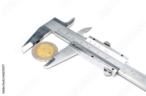 vernier caliper measures the coins
