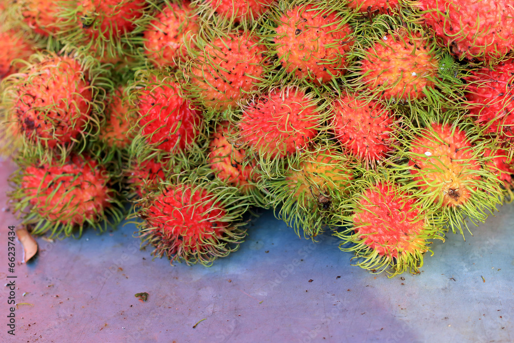 Sweet fruits rambutan in the market Sweet fruits rambutan in the market