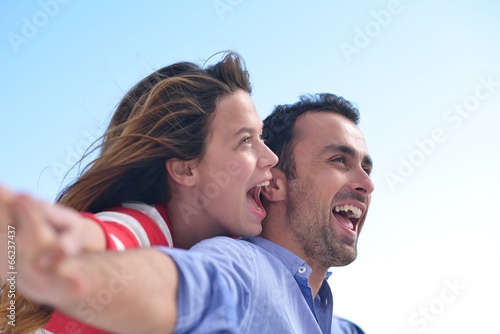 happy young romantic couple have fun relax