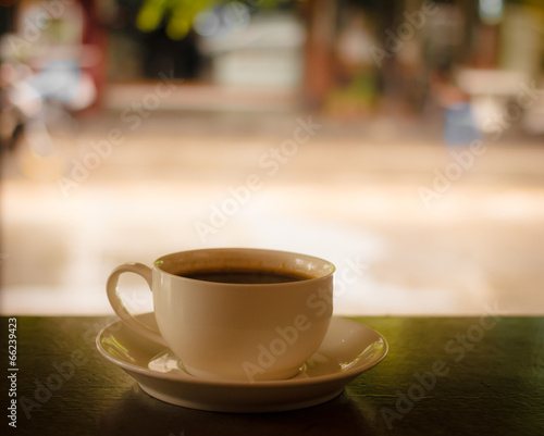 cup of coffe on black table
