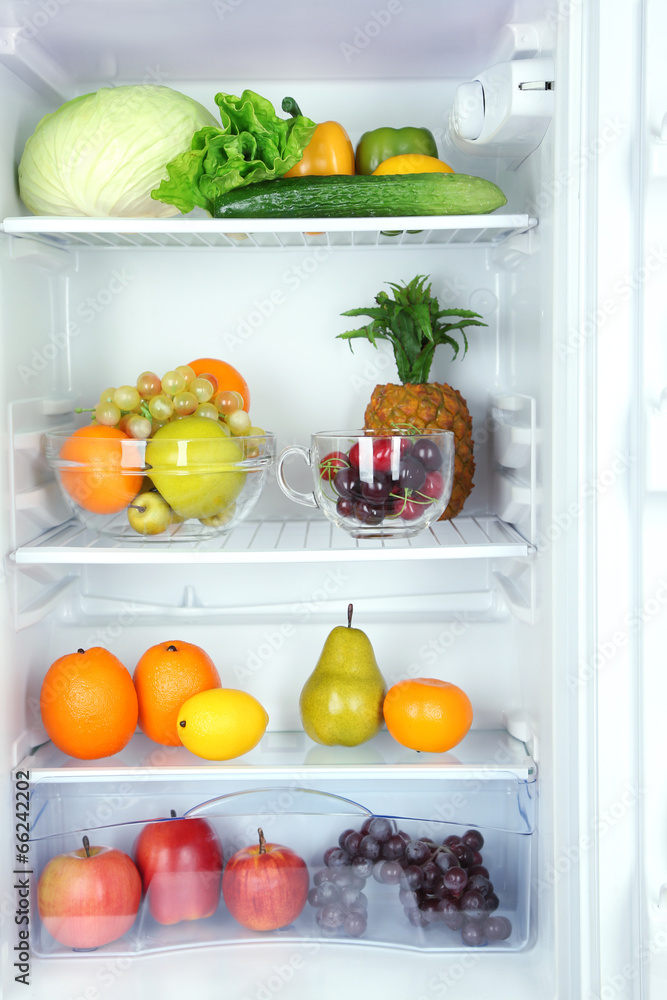 Vegetables and fruits in open refrigerator. Weight loss diet Vegetables and fruits in open refrigerator. Weight loss diet