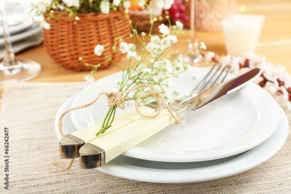 Table setting with spring flowers close up Table setting with spring flowers close up