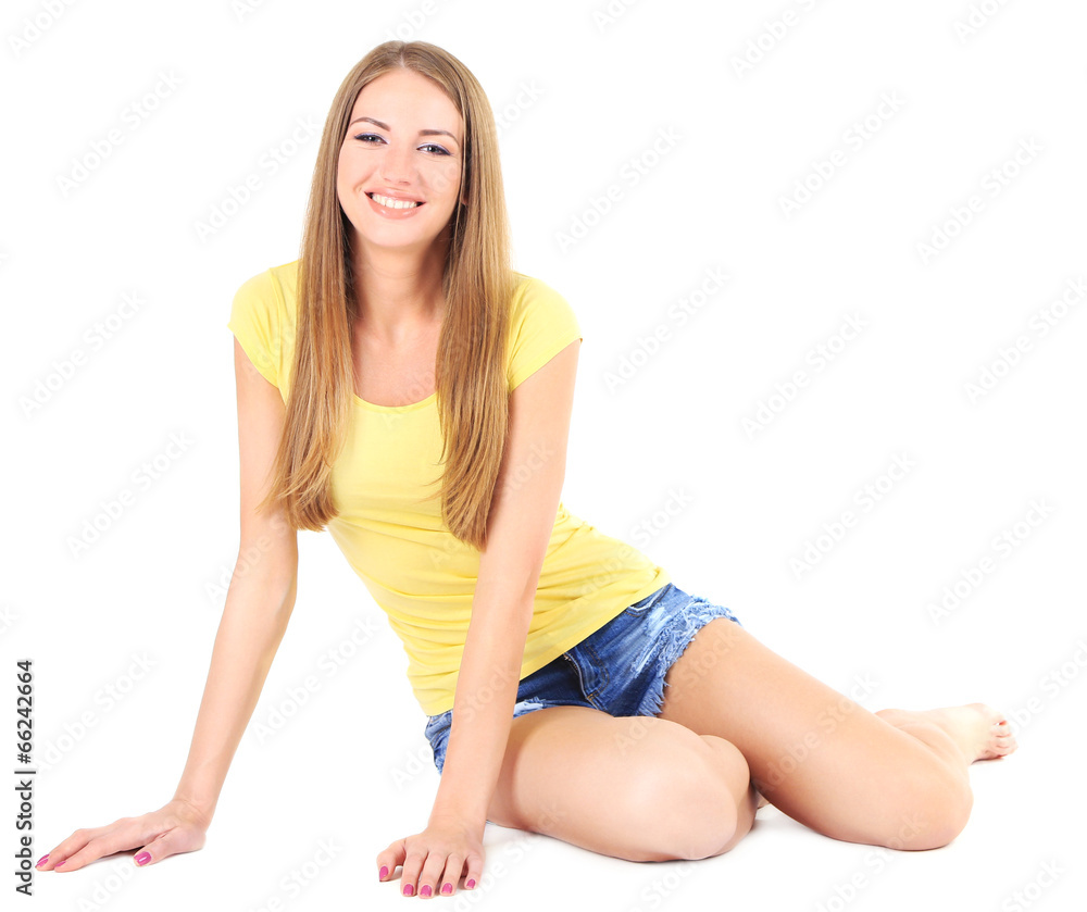 Beautiful young girl in shorts and t-shirt isolated on white Beautiful young girl in shorts and t-shirt isolated on white