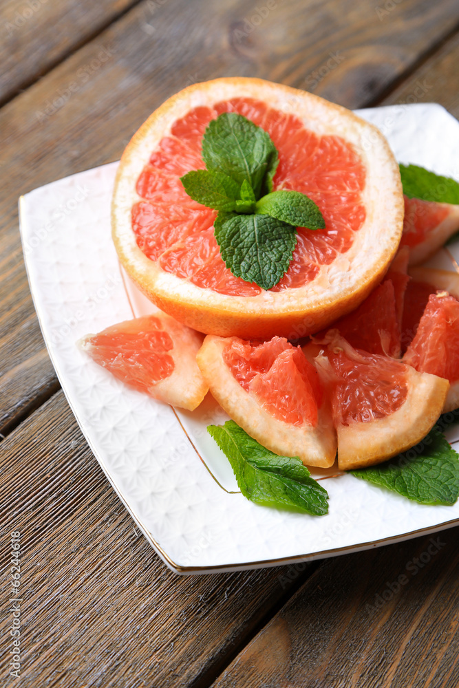 Ripe chopped grapefruit with mint leaves