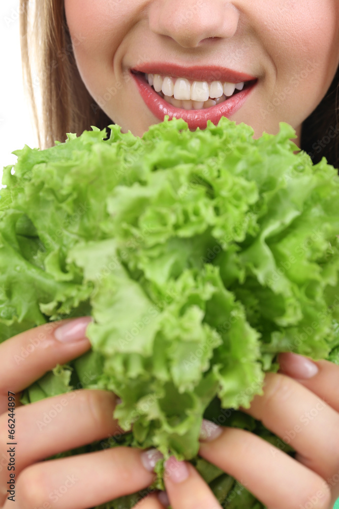 Beautiful girl with fresh lettuce, close up Beautiful girl with fresh lettuce, close up