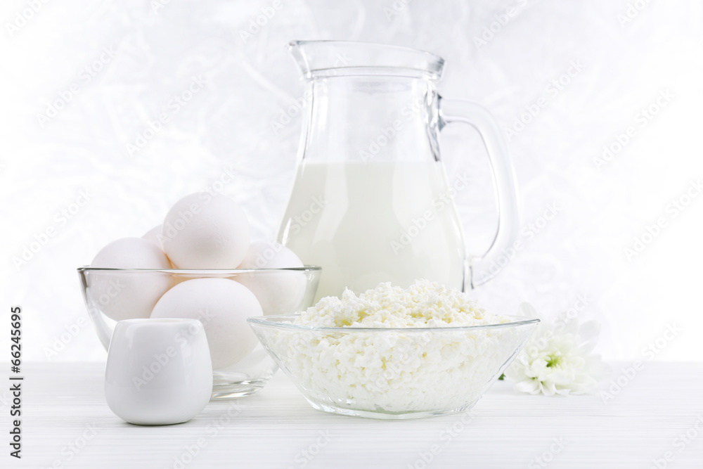 Tasty dairy products on wooden table Tasty dairy products on wooden table