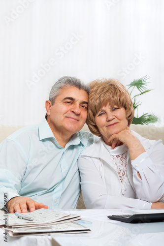senior couple dream smile sitting on sofa