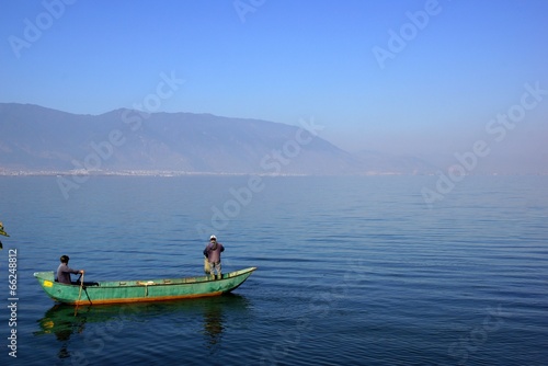 People fishing on Erhai lake  Dali  Yunnan province  China