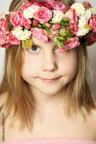 Young beauty, little girl and flowers