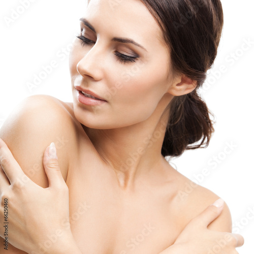 Woman touching skin or applying cream, isolated