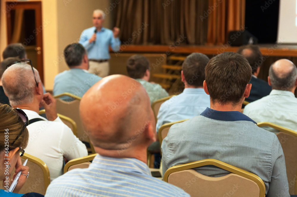 people sitting rear at the business conference and speaker people sitting rear at the business conference and speaker