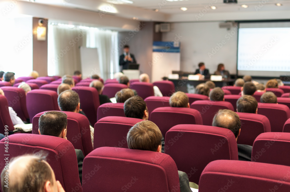 people sitting rear at the business conference and speaker