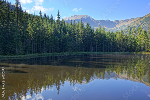 Reflection on Smreczynski lake in Koscieliska Valley, Tatras © Łukasz Kurbiel