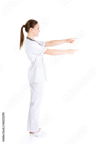 Nurse showing with hand