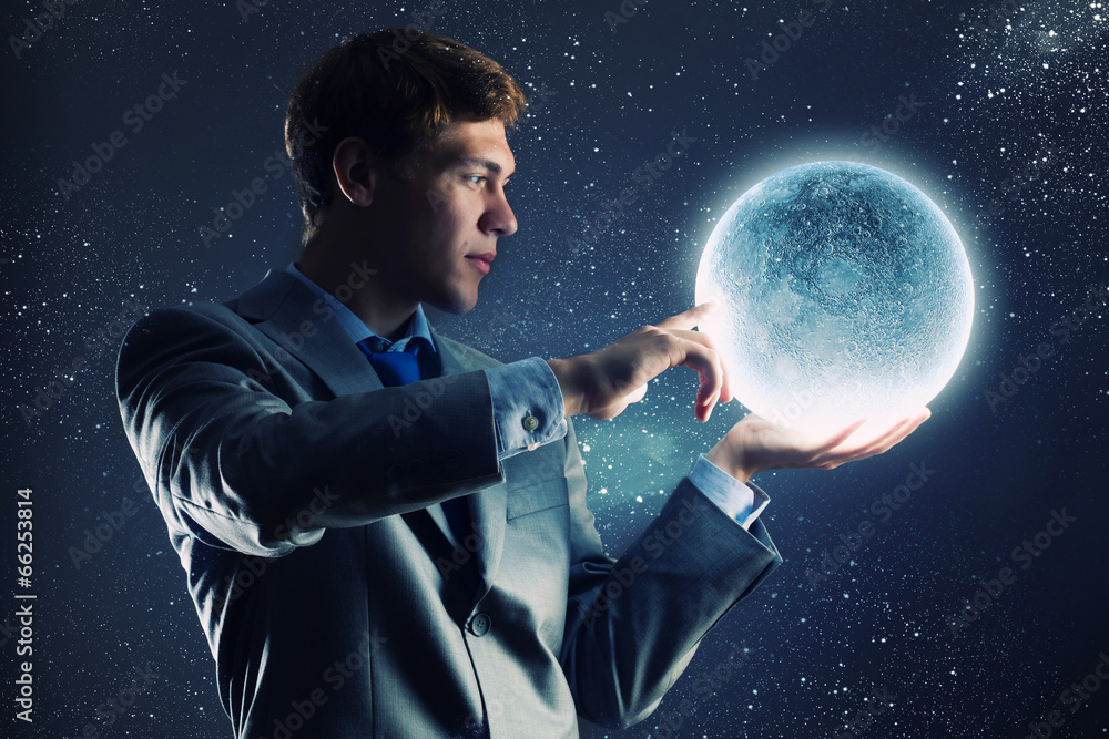 Obraz premium Businessman with moon