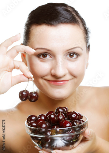 woman with cherries over white photo