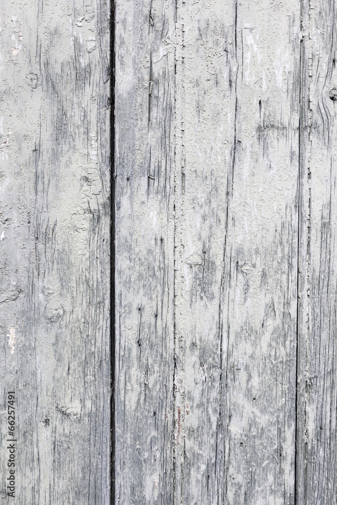 Rustic weathered barn wood background with knots and nail holes Rustic weathered barn wood background with knots and nail holes