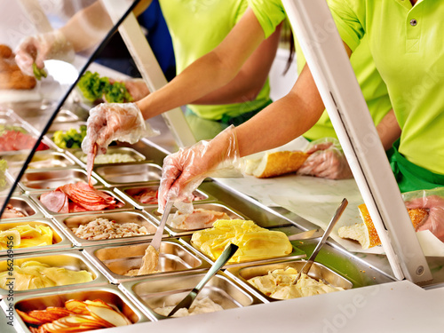 Bild auf Leinwand Tray with  food  on showcase at cafeteria