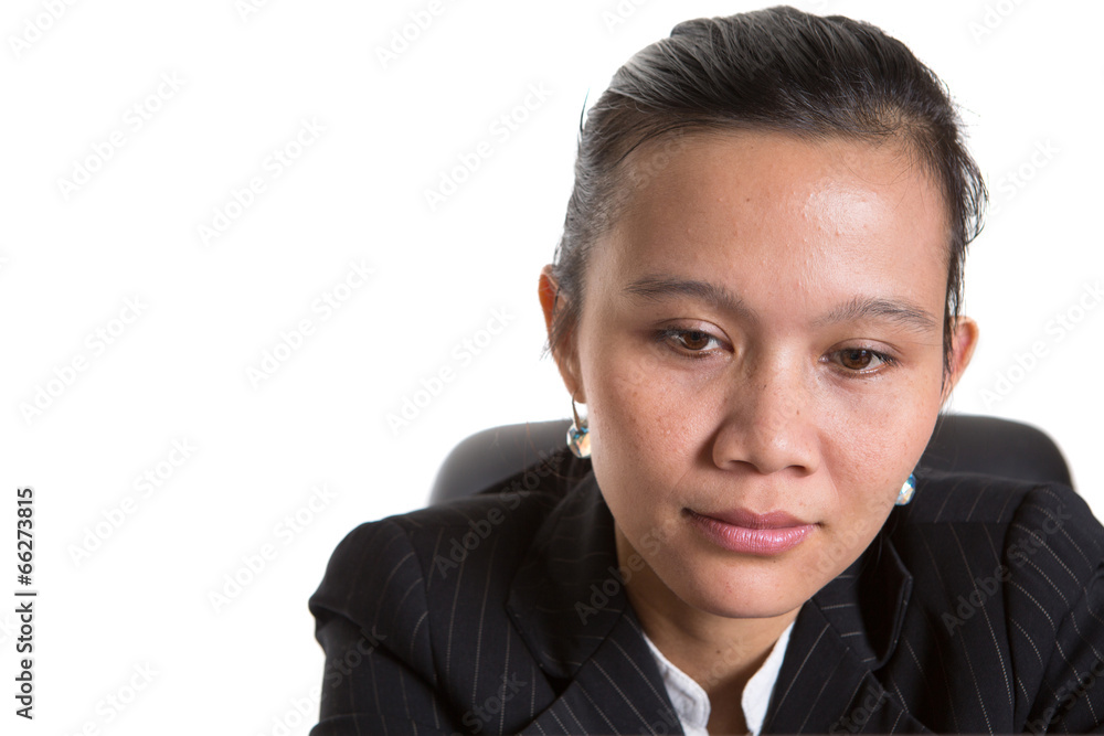 Asian businesswoman sitting at her office chair Asian businesswoman sitting at her office chair