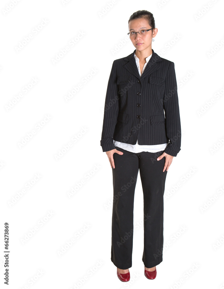 Asian businesswoman in a black suit over white background Asian businesswoman in a black suit over white background
