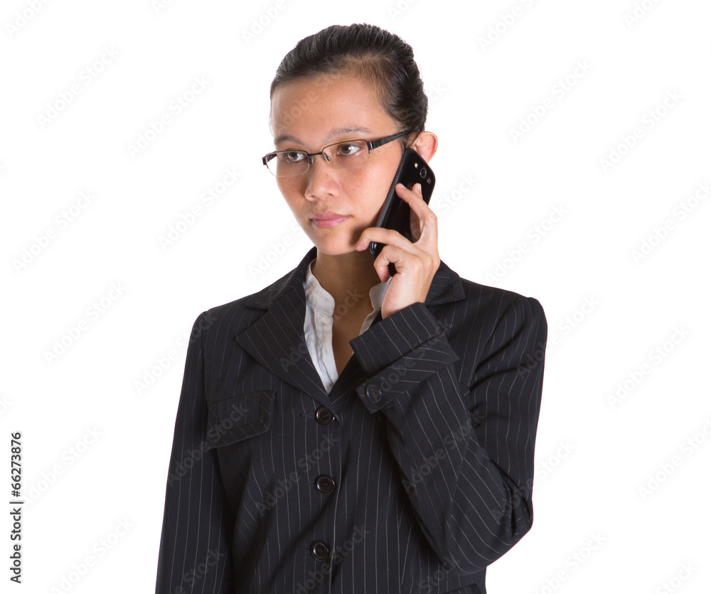 Asian businesswoman with a smart phone over white background Asian businesswoman with a smart phone over white background