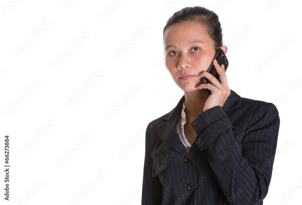 Asian businesswoman with a smart phone over white background Asian businesswoman with a smart phone over white background