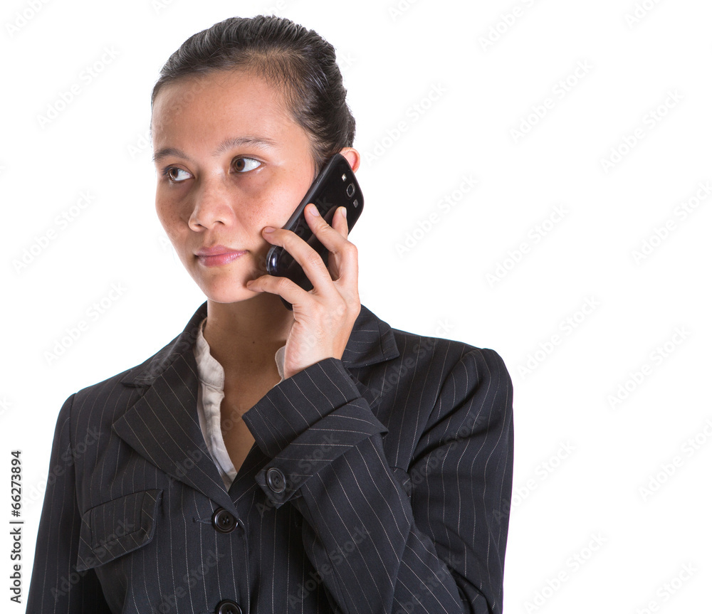 Asian businesswoman with a smart phone over white background Asian businesswoman with a smart phone over white background