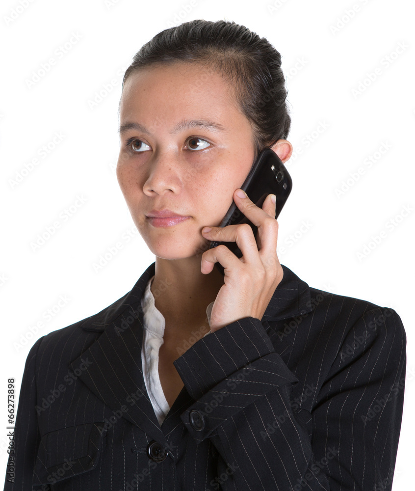 Asian businesswoman with a smart phone over white background Asian businesswoman with a smart phone over white background