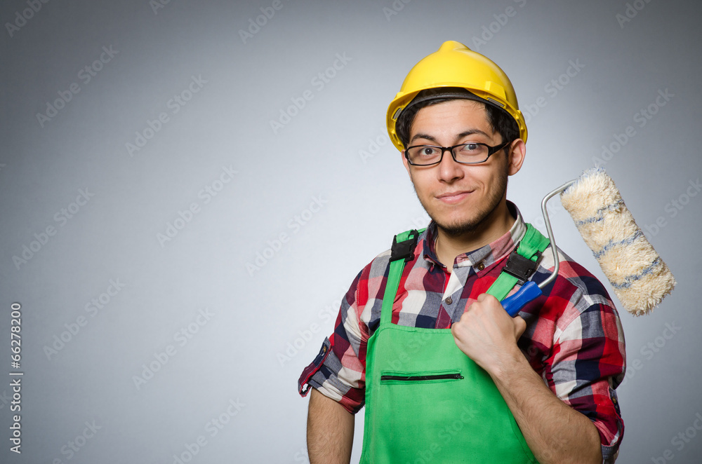Funny painter with hardhat and roller Funny painter with hardhat and roller