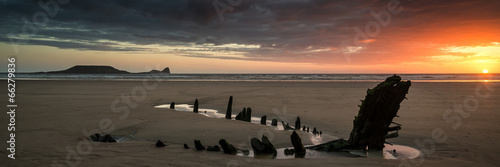 Landscape panorama ship wreck on Rhosilli Bay beach in Wales at