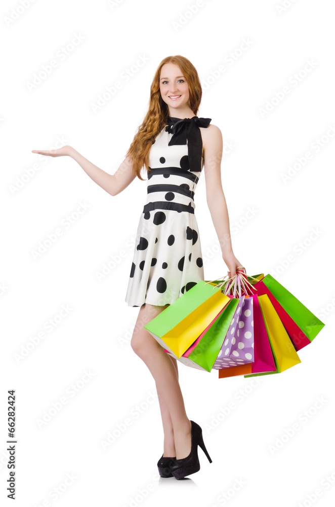 Woman with shopping bags isolated on white Woman with shopping bags isolated on white