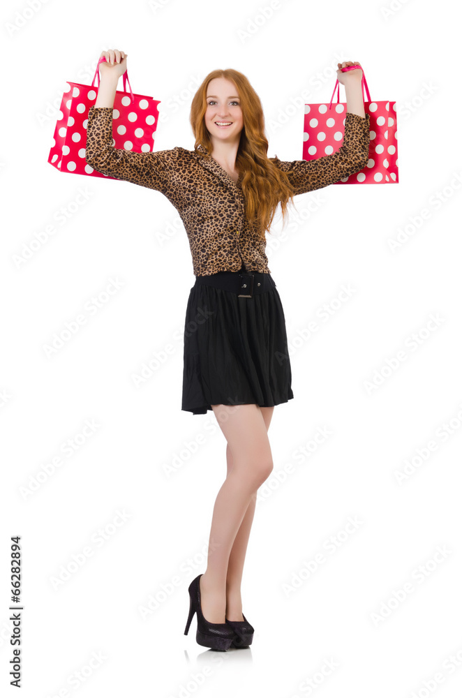 Woman with shopping bags isolated on white Woman with shopping bags isolated on white
