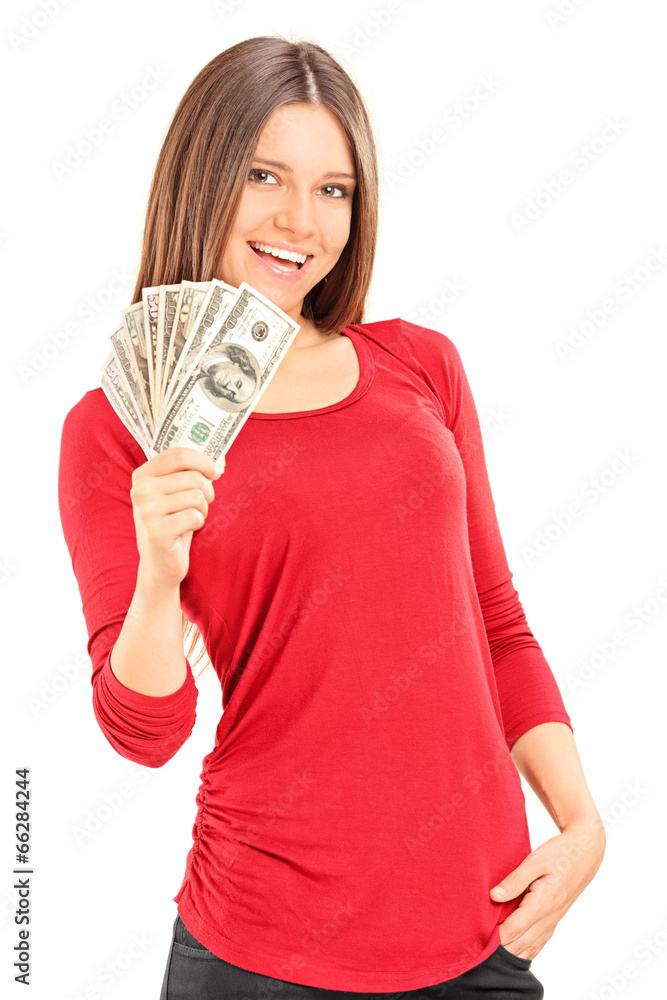 Beautiful young woman holding money Beautiful young woman holding money