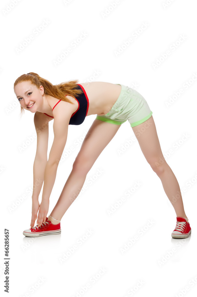 Young woman doing sport exercises isolated on white Young woman doing sport exercises isolated on white