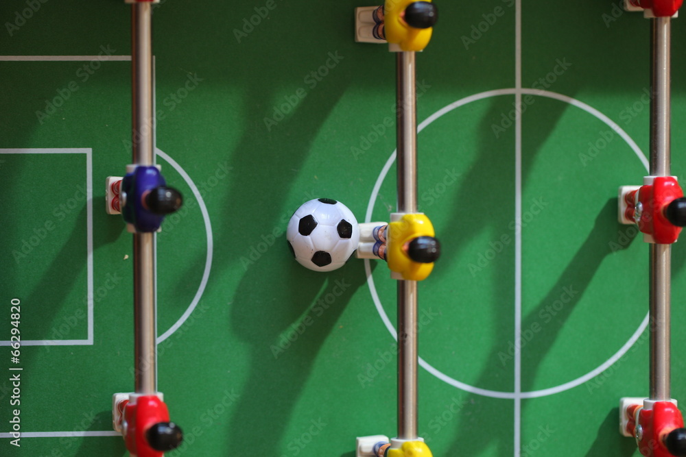 football - board game with players, soccer ball and green field football - board game with players, soccer ball and green field