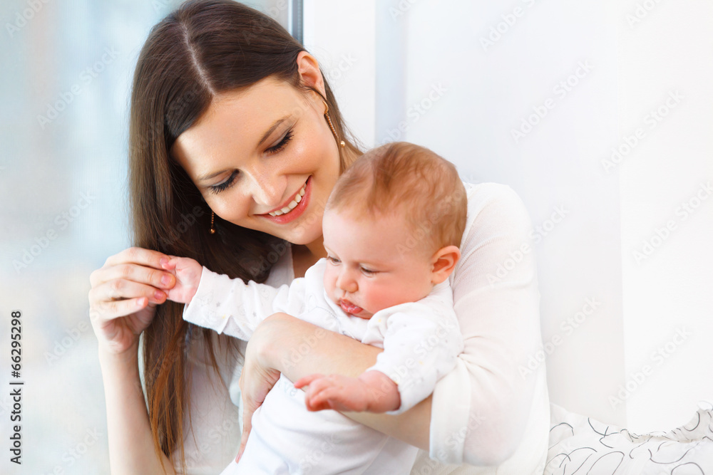 Mother and Baby playing. Happy Family Mother and Baby playing. Happy Family
