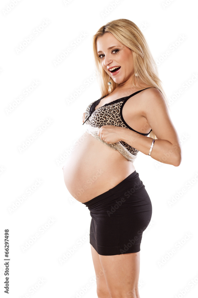 side view of pregnant woman in short skirt Stock Photo | Adobe Stock