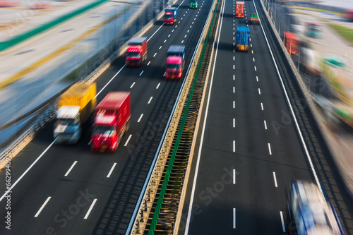motion trucks on the freeway © kalafoto