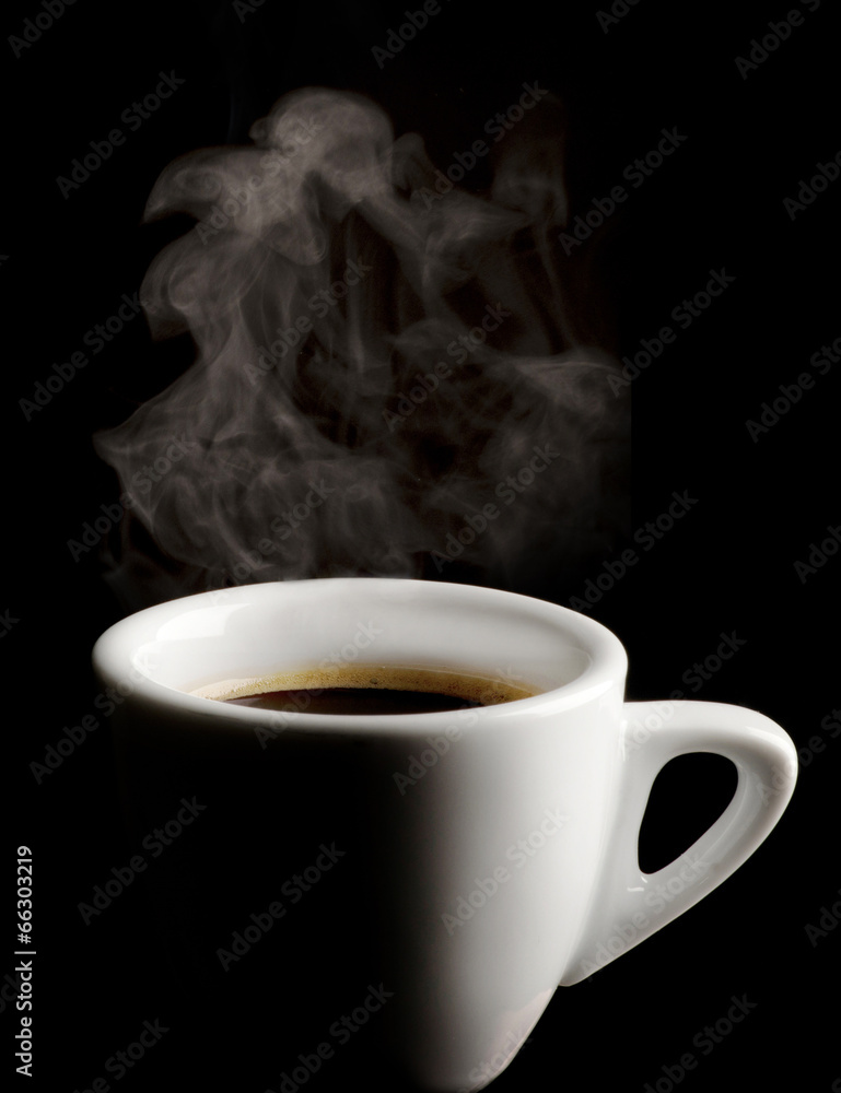 cup of coffee on black background cup of coffee on black background