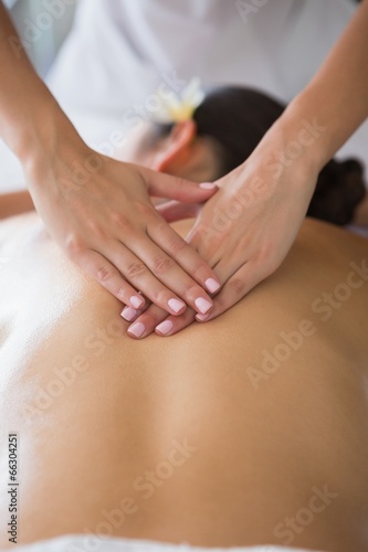 Wallpaper Mural Brunette enjoying a back massage Torontodigital.ca