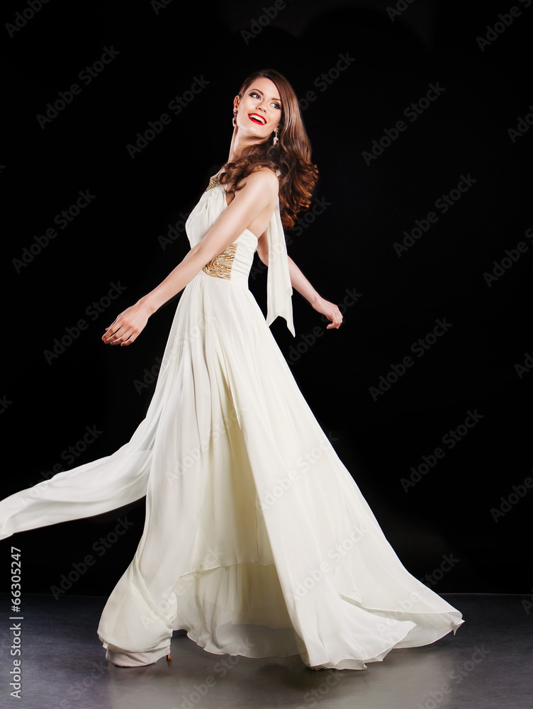 Young smiling happy woman wearing fashionable white dress