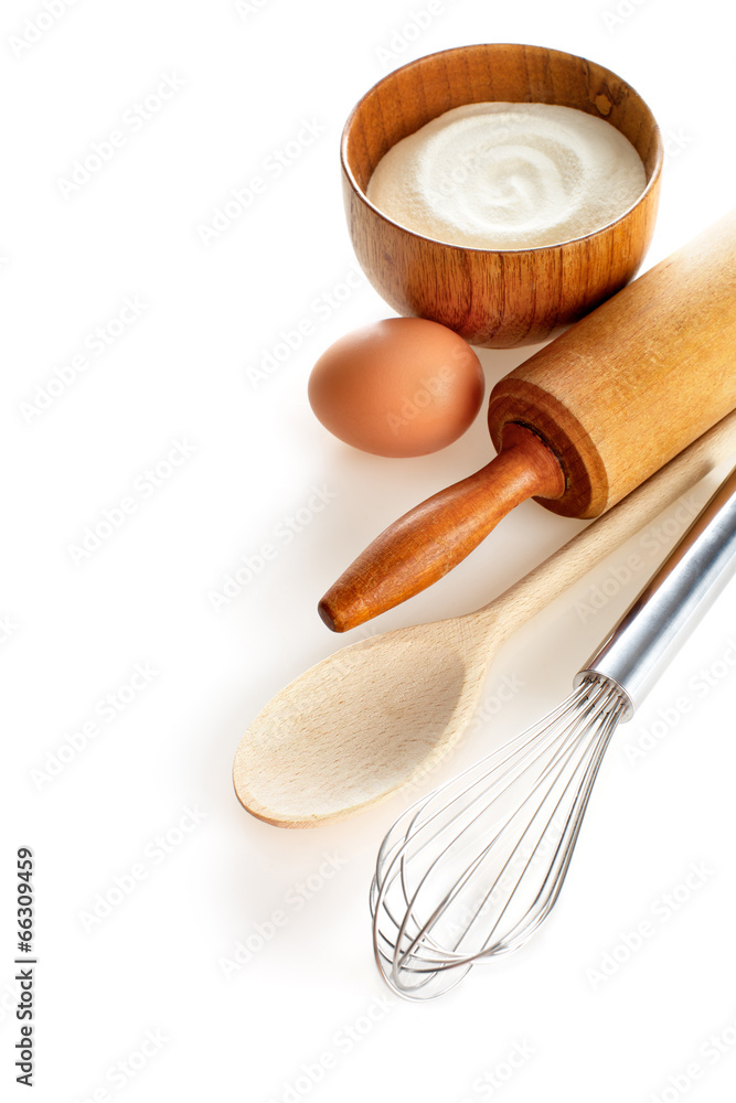 Ingredients and kitchen tools on white background.